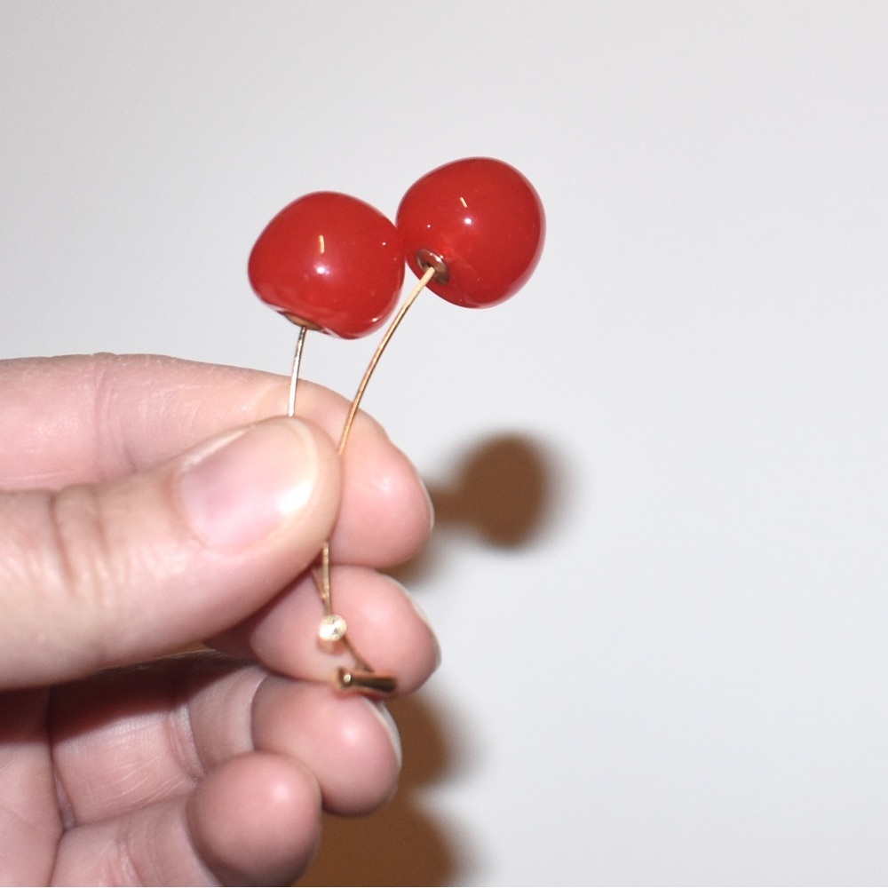 Small bright red cherry dangle earrings gold